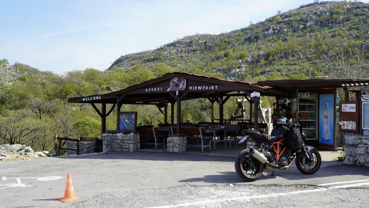 Motorcycle parked next to the cafe around Skadar Lake Montenegro